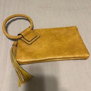 EUC tan clutch